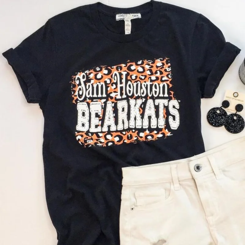 Luxury Women's Clothes Bearkat Game Day | Sam Houston Bearkats on Leopard Print Background Logo Short Sleeve Tee Shirt in Black